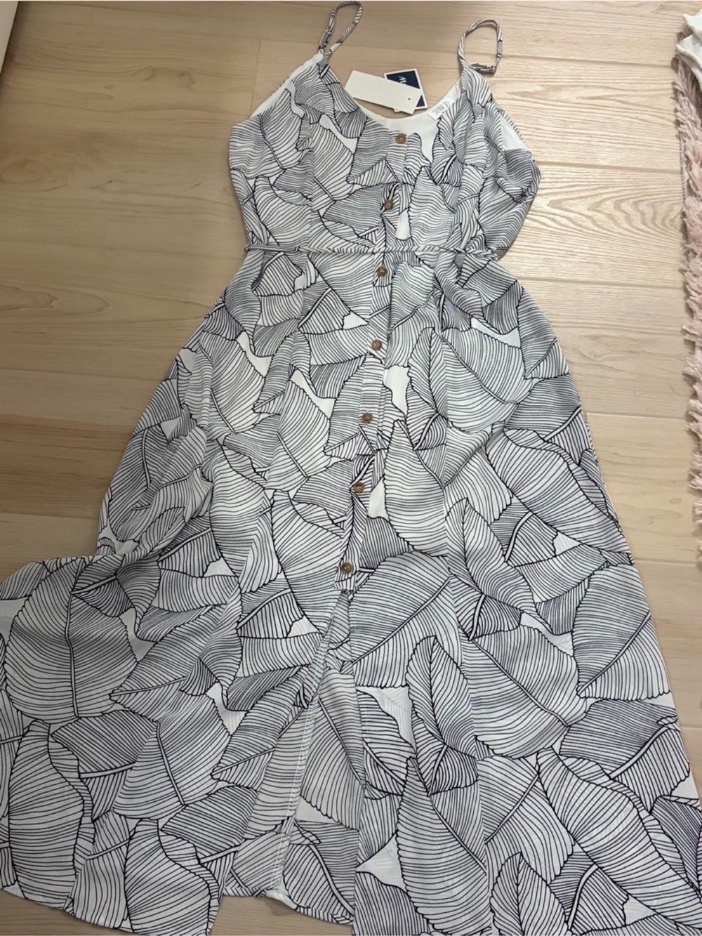 Sleeveless White Maxi Dress with Black Leaf Print